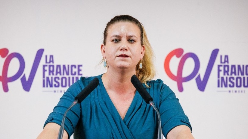 National Assembly parliamentary group President of La France Insoumise (LFI) Mathilde Panot addresses a speech as she takes part in a meeting calling for "Peace and Justice for Palestine" in Marseille, on 23 November 2023 (AFP)