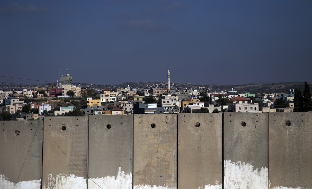 Israel's separation wall is pictured on 22 September (AFP)