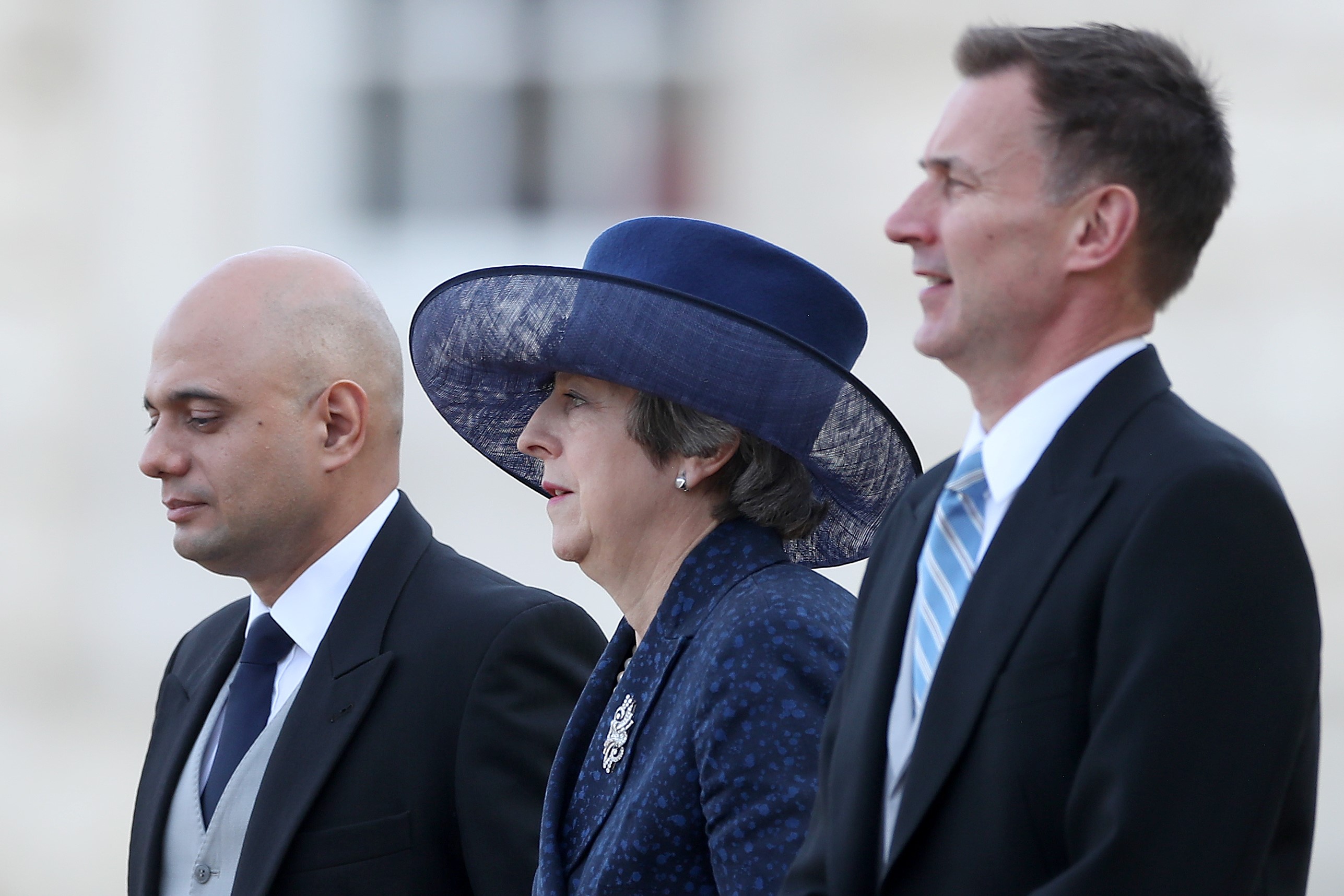 (L-R) Britain's Home Secretary Sajid Javid, Britain's Prime Minister Theresa May and Britain's Foreign Secretary Jeremy Hunt 