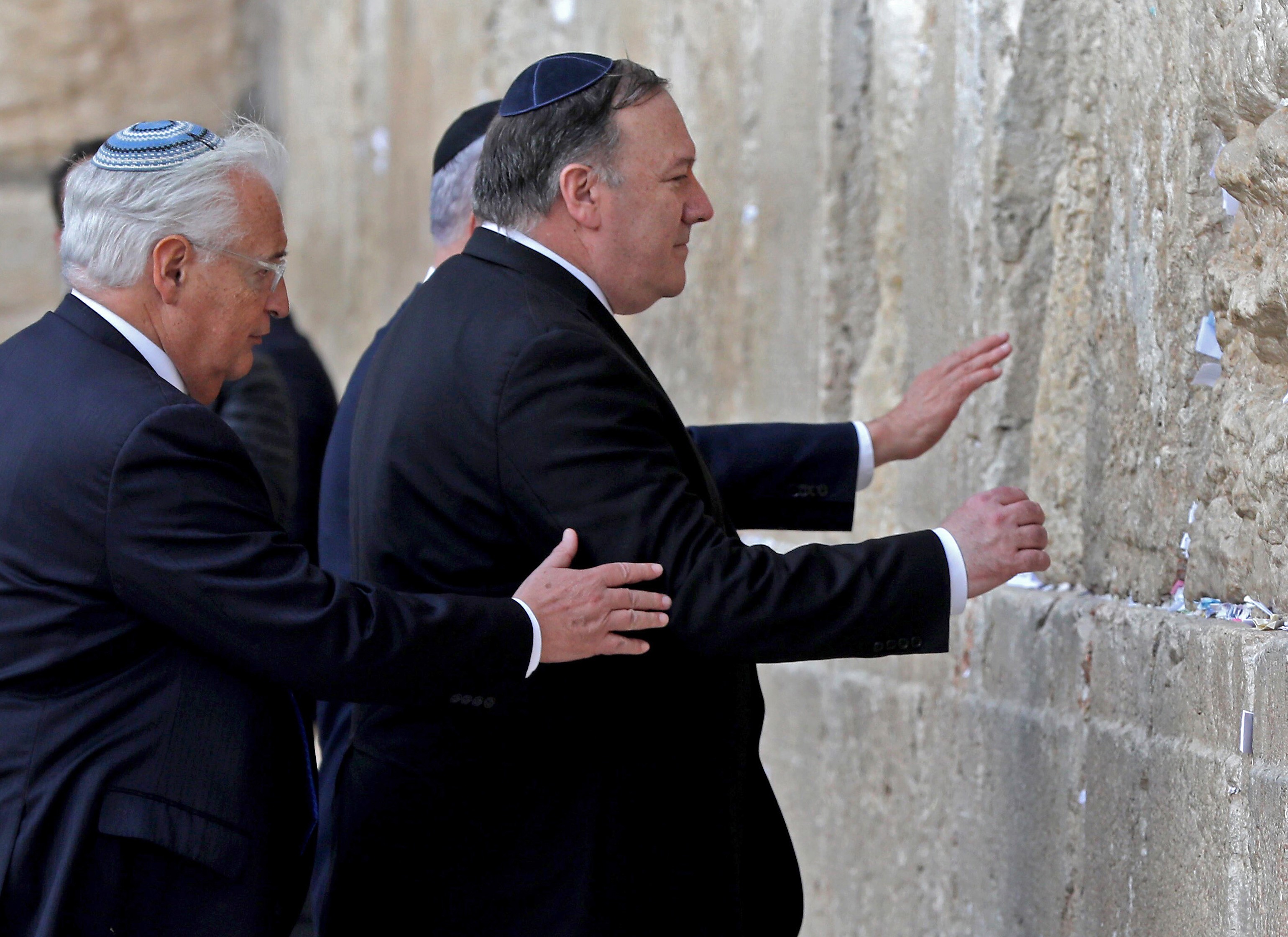 US Secretary of State Mike Pompeo (R), accompanied by US ambassador to Israel David Friedman (L), prays at the Western Wall in Jerusalem's Old City on March 21, 2019