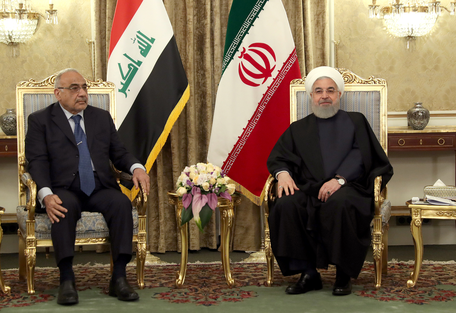 A handout picture provided by the Iranian presidency on April 6, 2019 shows Iranian President Hassan Rouhani (R) meeting with Iraqi Prime Minister Adel Abdel Mahdi in the Iranian capital Tehran (AFP)