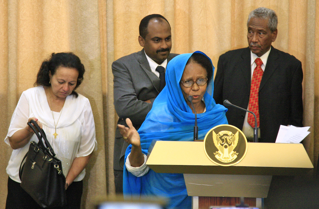 Aisha Mousa, a civilian member of Sudan's new sovereign council, speaks while flanked by other council members Raja Nicolas Abdel Massih, Mohamed al-Fakki Suleiman , and Hassan Idris (AFP)