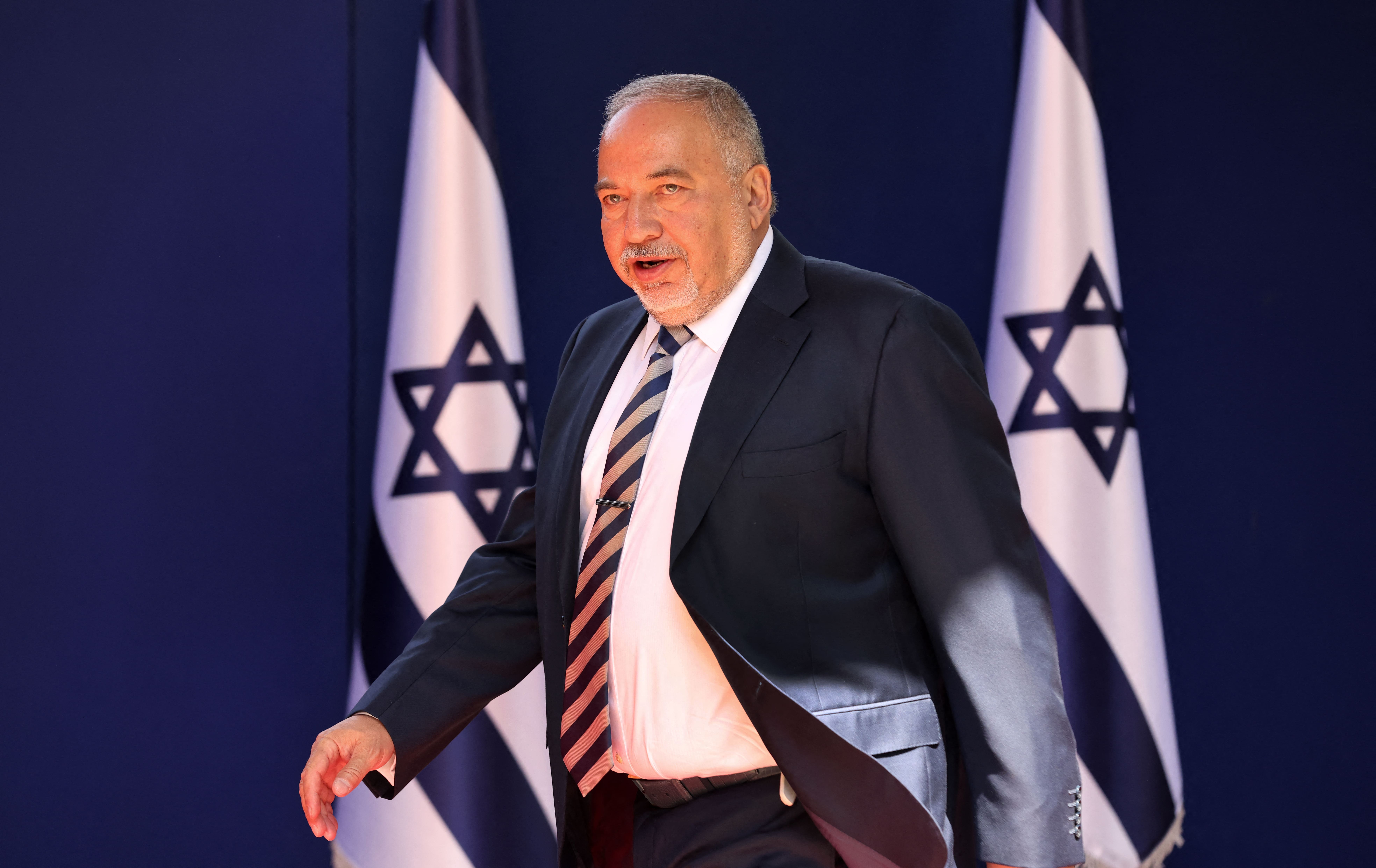 Avigdor Lieberman, Israel's right-wing secular nationalist who heads the Yisrael Beitenu party, arrives at the President's residence in Jerusalem for a picture, on 14 June, 2021, (AFP)