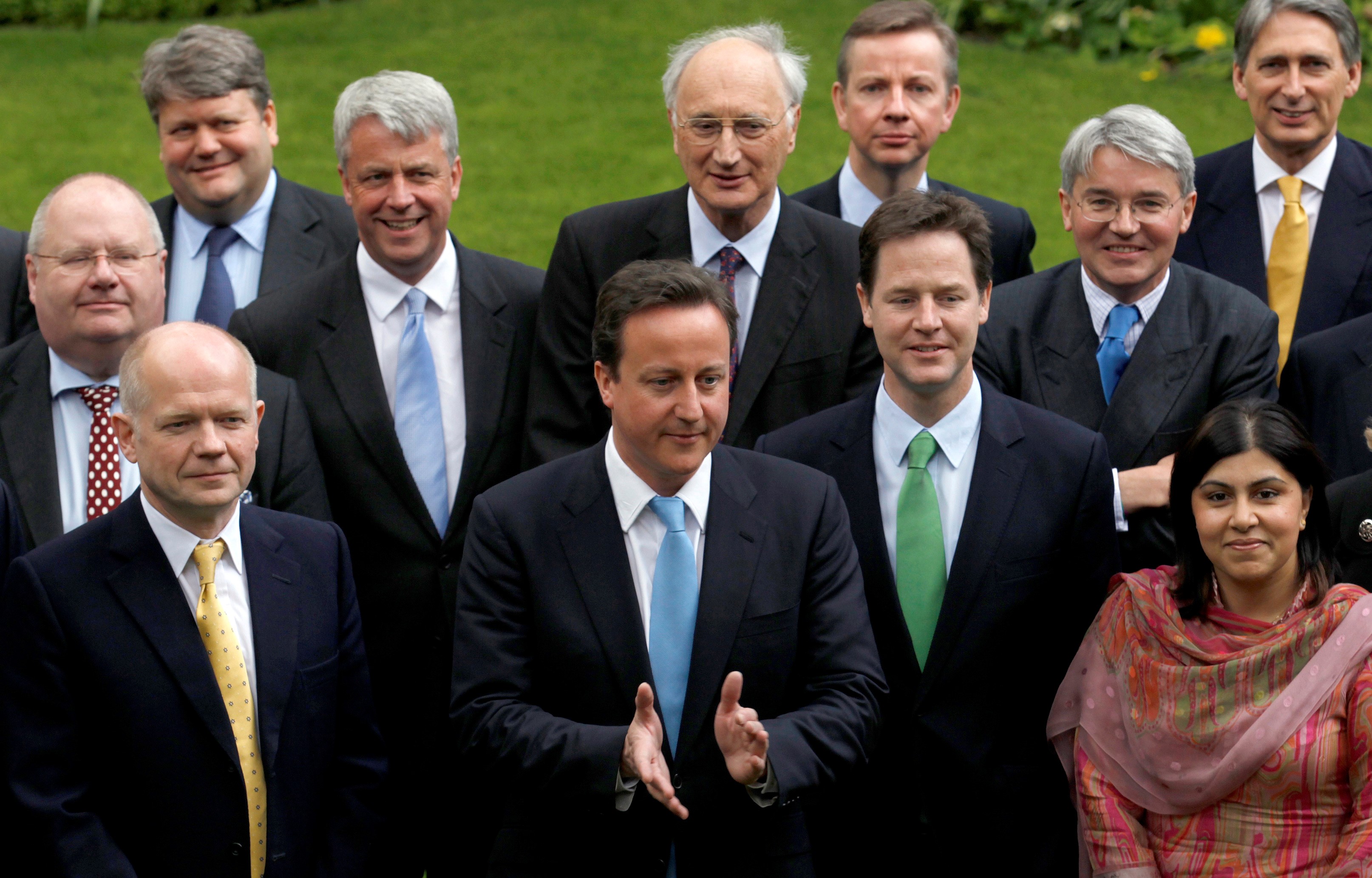  Britain's Prime Minister David Cameron in a group picture with his new cabinet in the garden of 10 Downing Street in London May,2010 (Reuters)