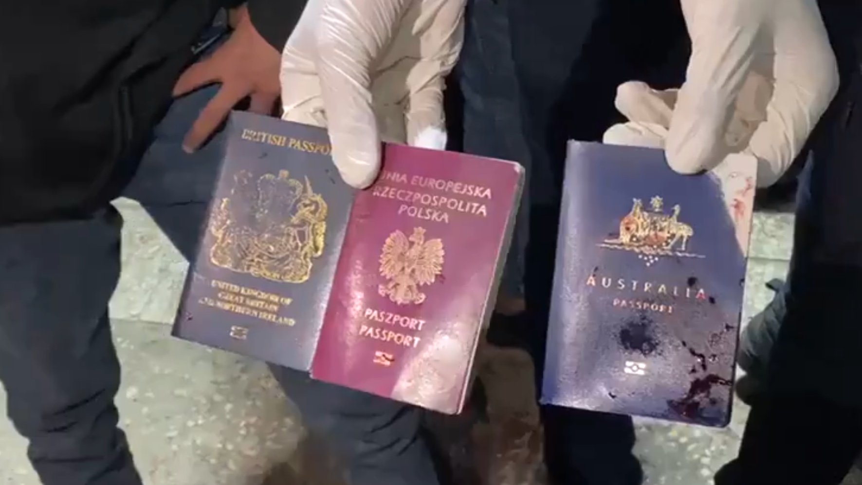 The passports of three of the killed aid workers (Screenshot/X) 