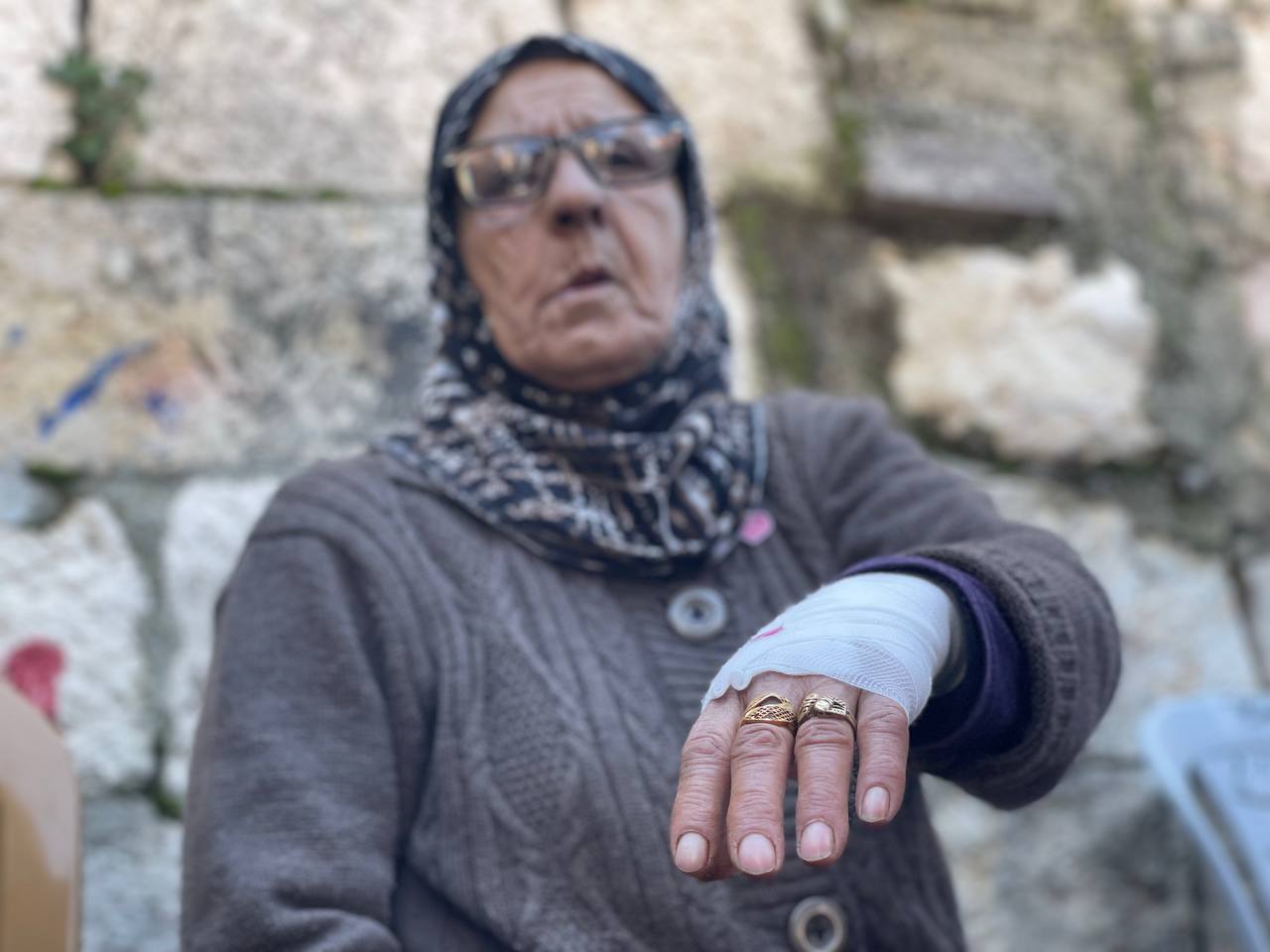 Fatima Salem, 73, owner of Palestinian home in East Jerusalem's Sheikh Jarrah was assulted by settlers on 13 February 2021. (Latifeh Abdellatif/MEE)