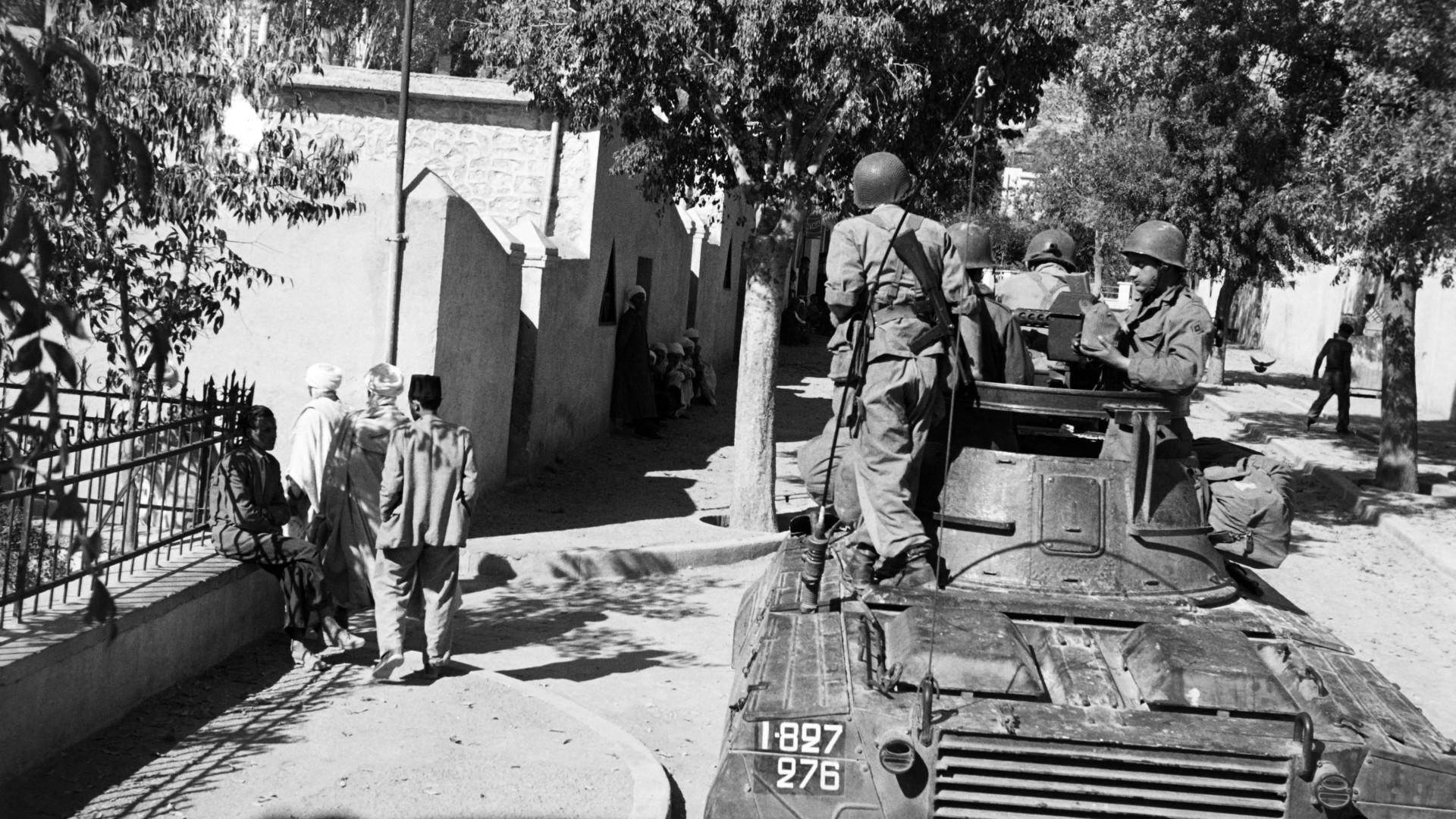A French army machine gun patrols the streets of Arris in the wilaya of Batna on 8 November 1954, while reinforcements were sent to Algeria to counter the revolt (Pierre Bonnin/AFP)