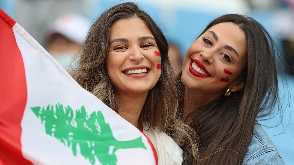 Lebanon supporters pose for a picture ahead of the FIFA Arab Cup 2021 group D football match between Lebanon and Algeria at the Al-Janoub Stadium in the Qatari city of Al-Wakrah on December 4, 2021. AFP.jpg