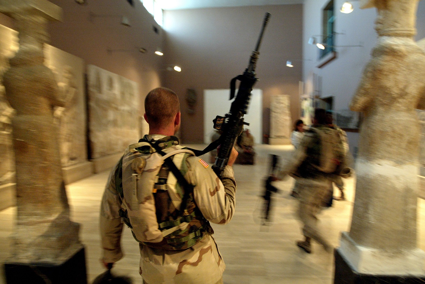 Two US soldiers from the 1st Division, 2nd Bridage, Texas, visit the Iraq Museum 10 September 2003 in Baghdad AFP