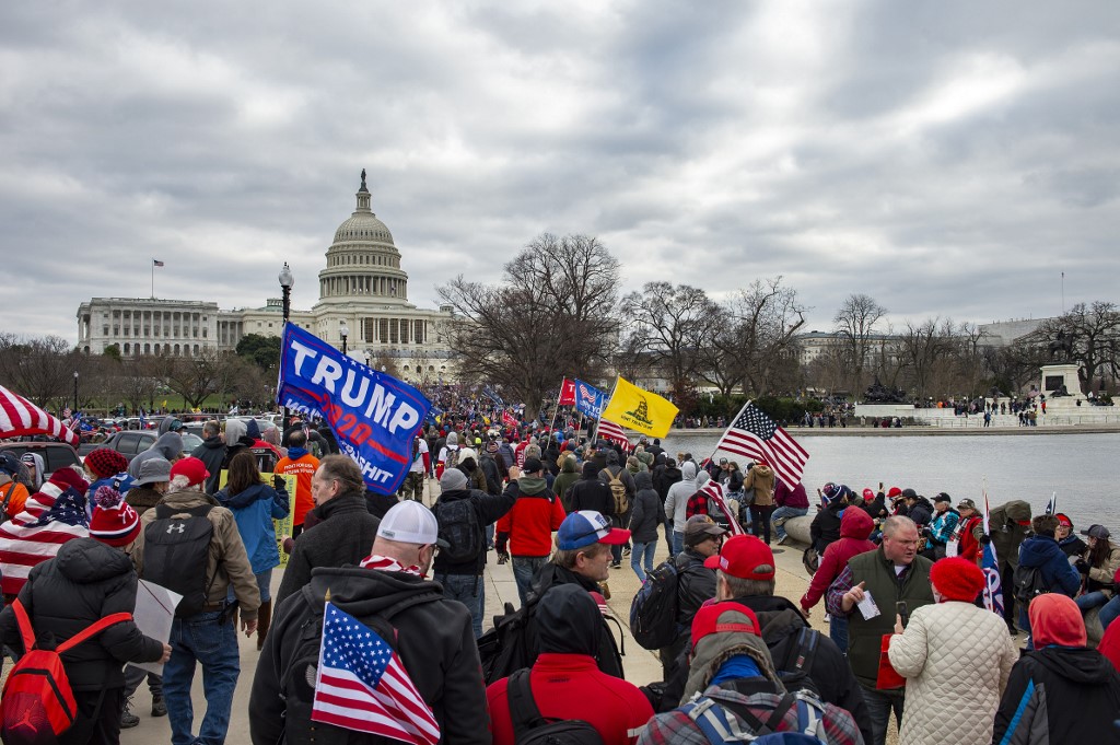 Trump supporters march to the Capitol in Washington on 6 January 2021 (AFP)