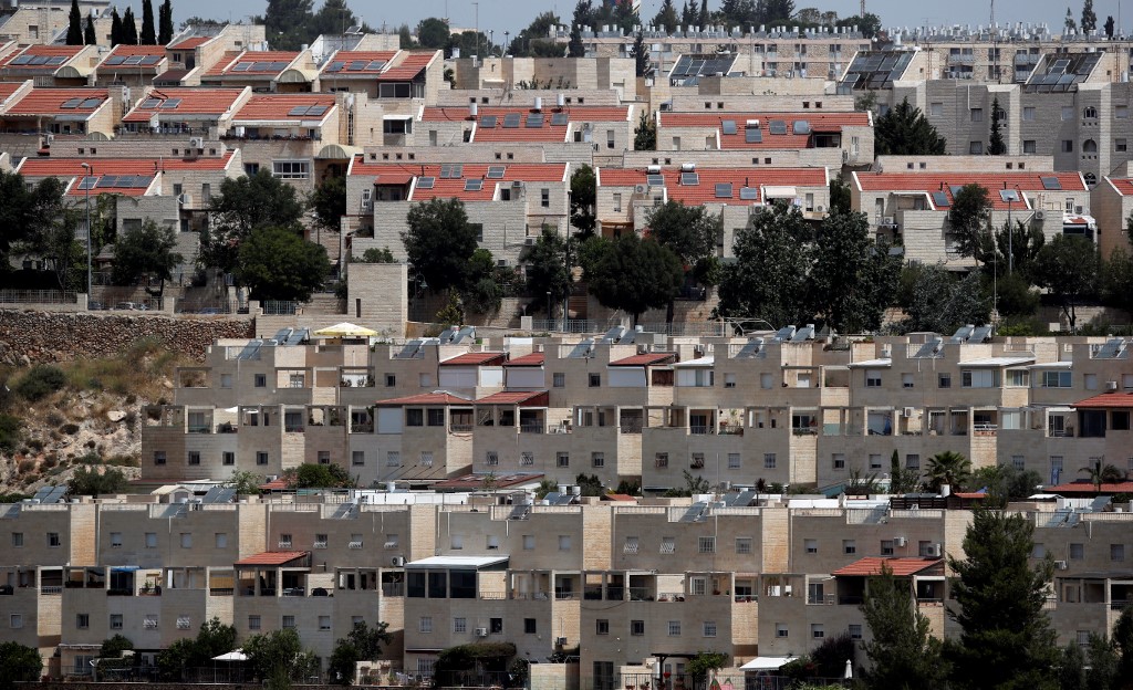 Buildings are under construction in a Jewish settlement in Jerusalem on 6 June (AFP)
