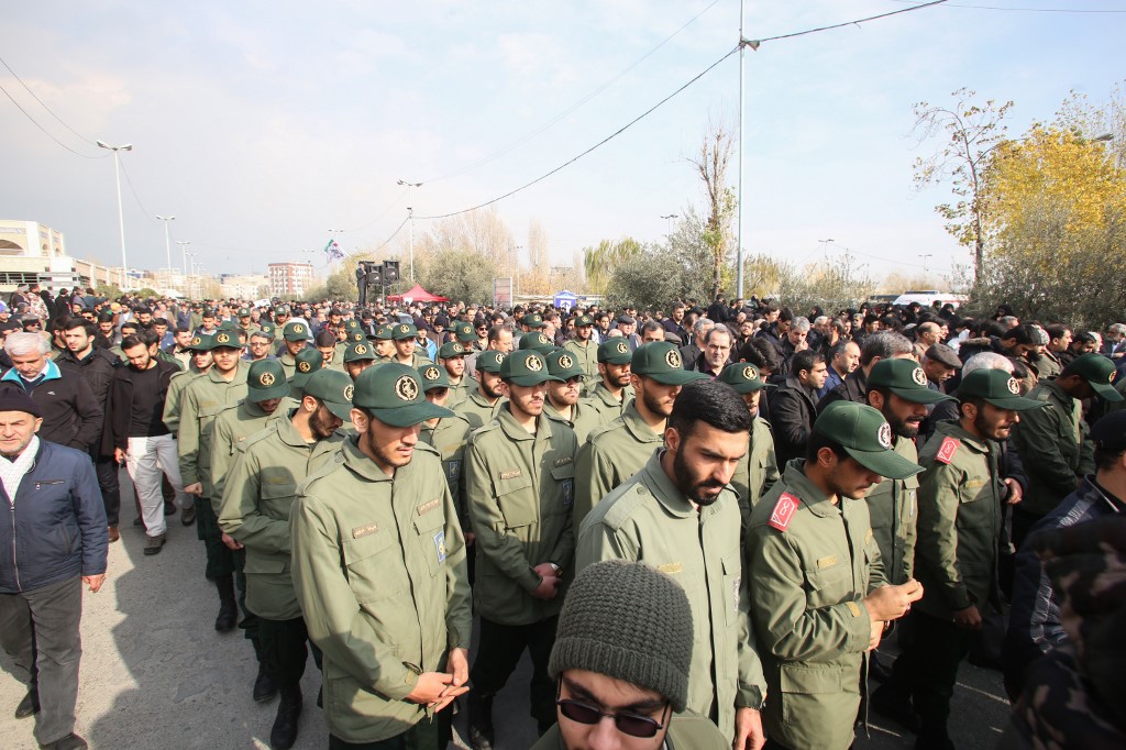 IRGC members protest in Tehran on 3 January over the US killing of Soleimani (AFP)