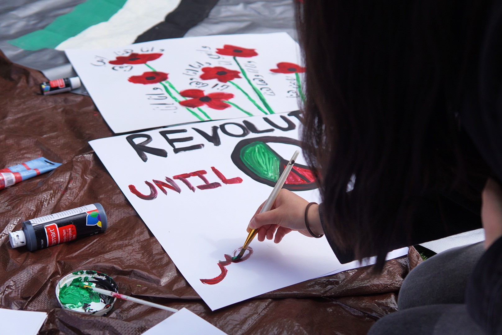 Several students made stickers, posters, and banners for Palestine (Azad Essa/MEE)