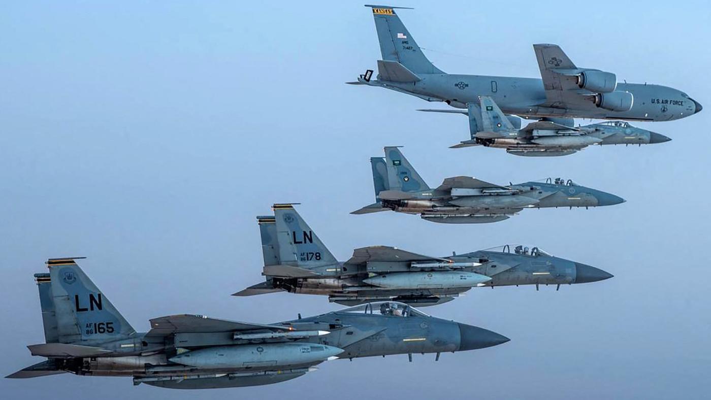 Saudi F-15 fighter jets fly in formation with their US Air Force counterparts on 2 June 2019 (AFP)
