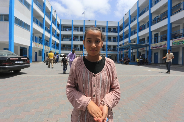  11-year-old Anwar Azam arrives at UNRWA school (MEE / Mohammed Asad) 