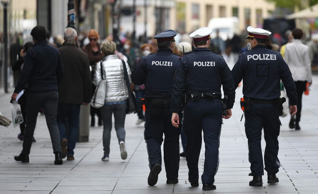 Police patrol central Vienna on 3 May 2021 (AFP)
