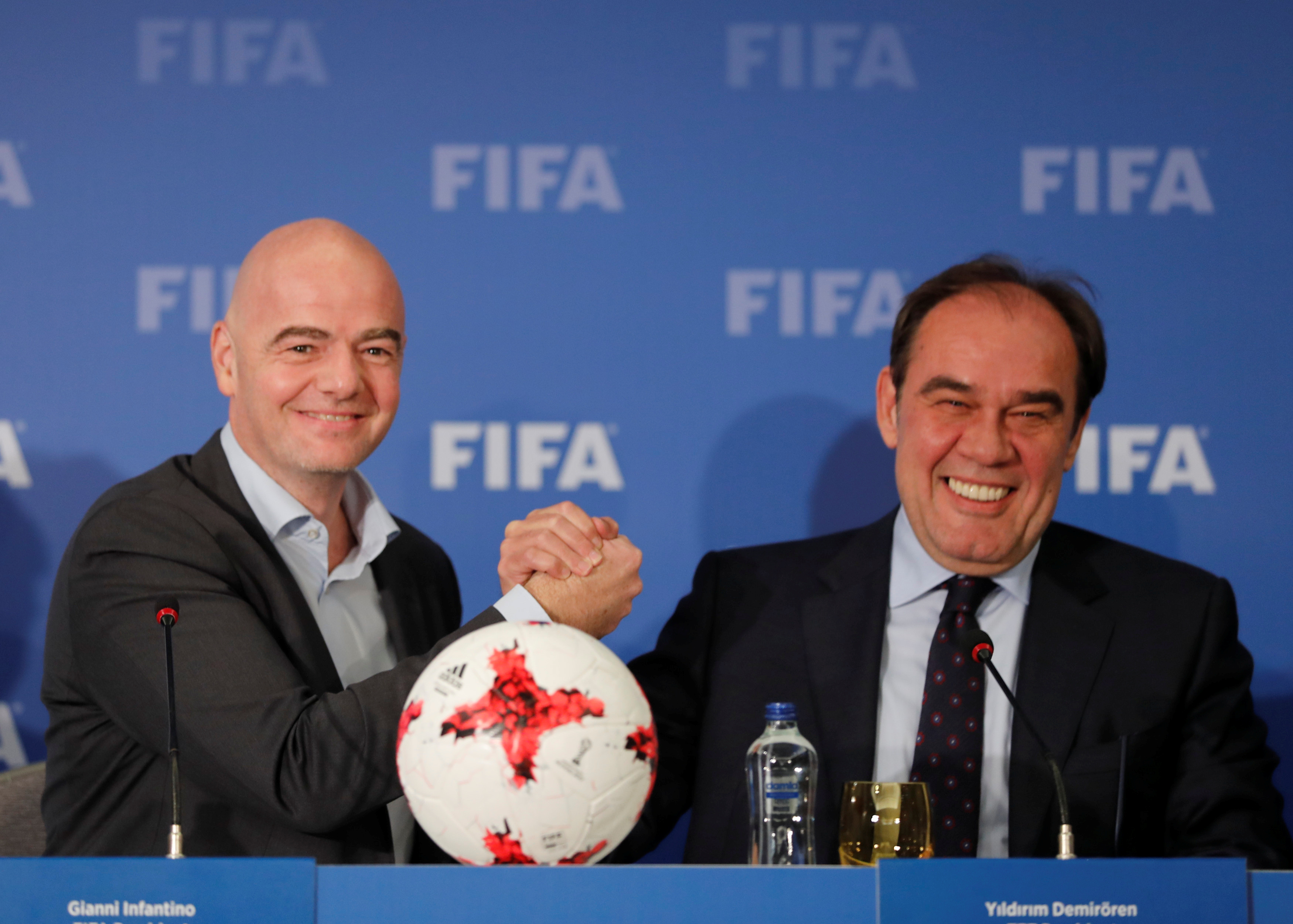 FIFA President Gianni Infantino (L) holds a news conference with Turkish Football Federation (TFF) President Yildirim Demiroren in Istanbul (Reuters)