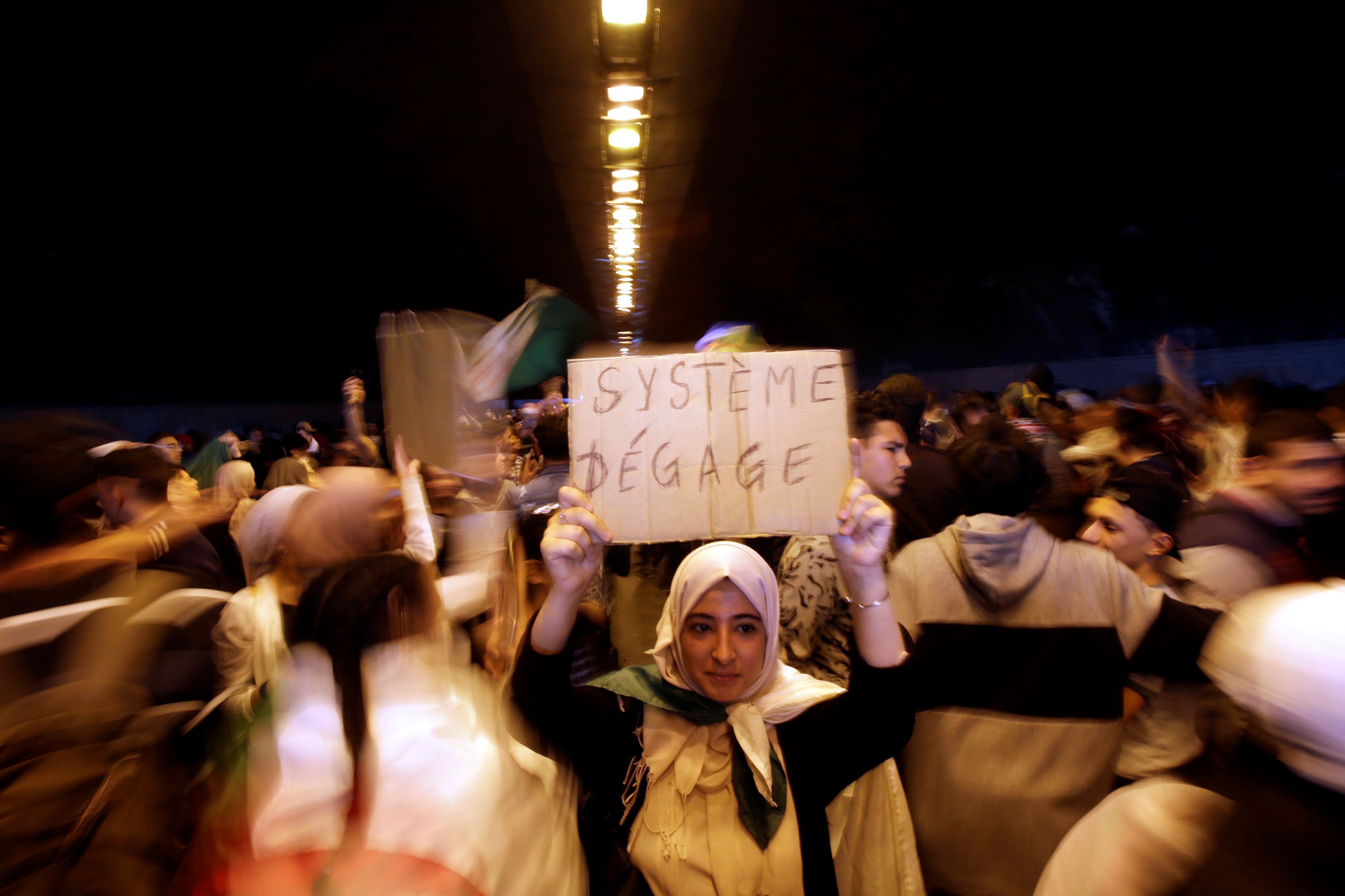  People take part in a protest demanding immediate political change in Algiers, Algeria 12 March 2019 (Reuters)