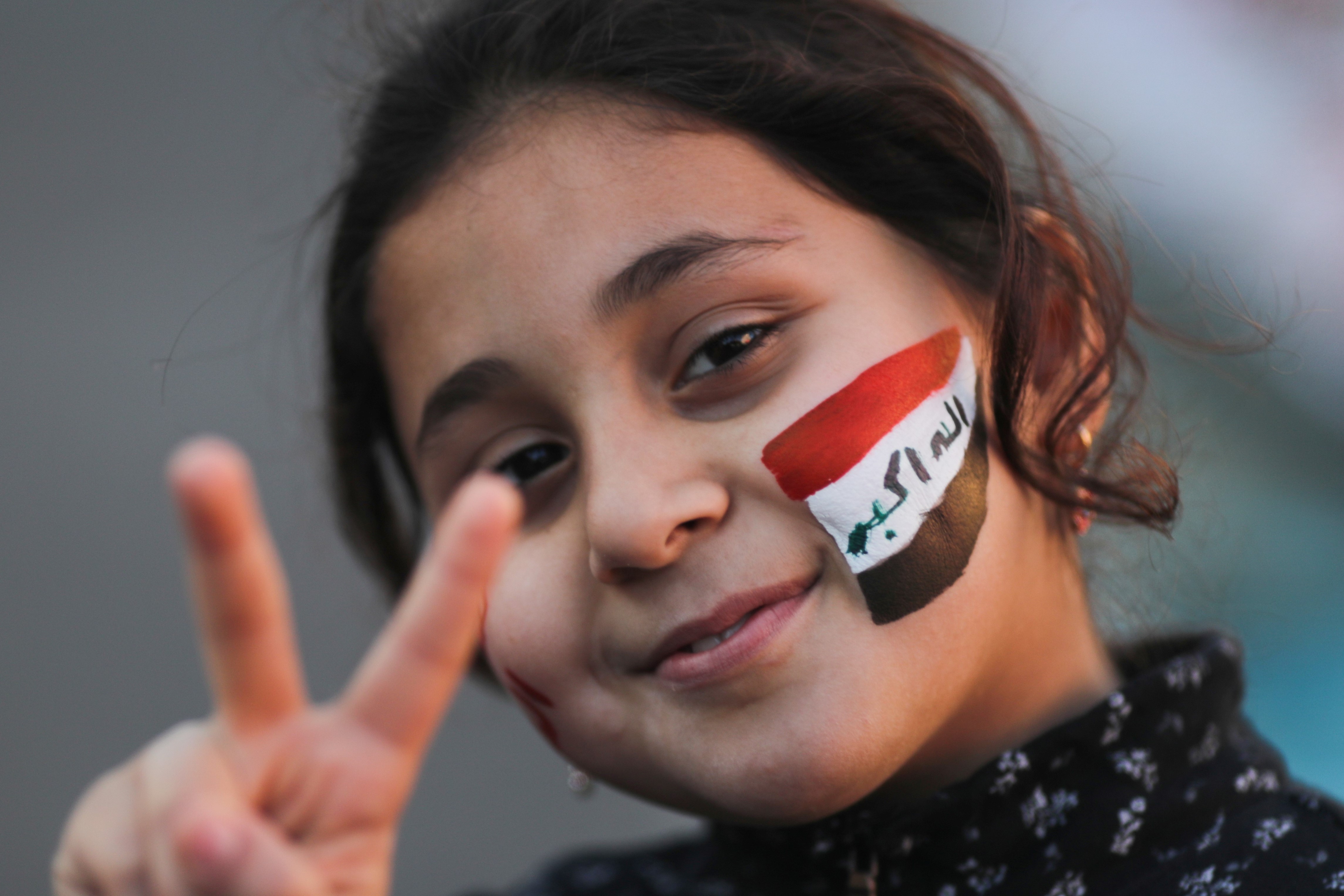 An Iraqi girl gestures during ongoing anti-government protests in Baghdad, Iraq December 20, 2019. REUTERS