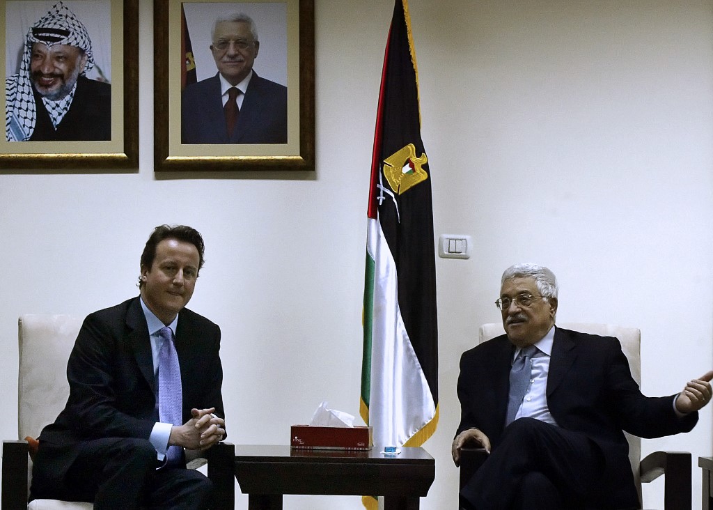 Britain's then-opposition leader David Cameron meets Palestinian leader Mahmoud Abbas, in the West Bank city of Ramallah, 2 March 2007 (AFP)