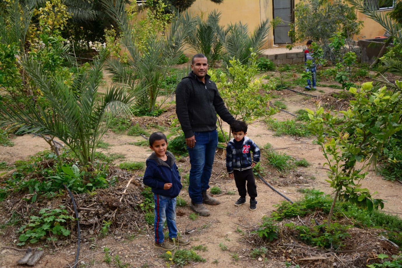 Hayel Abu Yahya and his family manage Greening the Desert’s farm. (Marta Vidal/MEE)