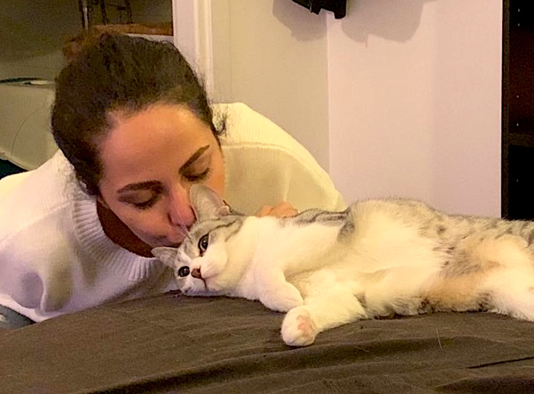 Iranian woman kisses her cat MEE