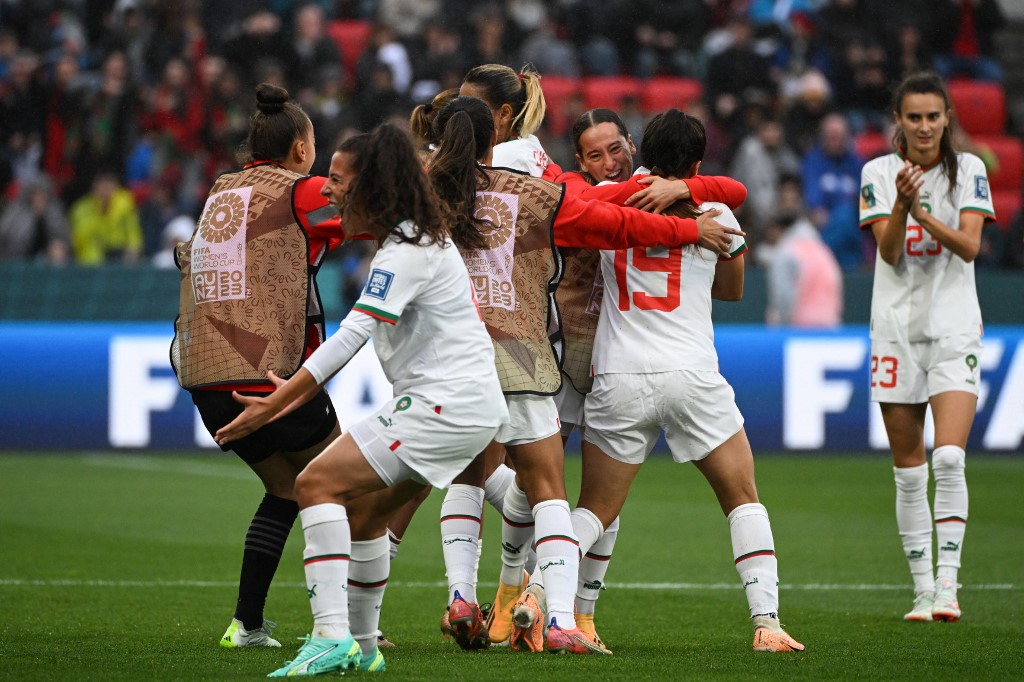 Morocco players celebrate their victory after the end of the Australia and New Zealand 2023 Women's World Cup Group H football match between South Korea and Morocco at Hindmarsh Stadium in Adelaide on July 30, 2023