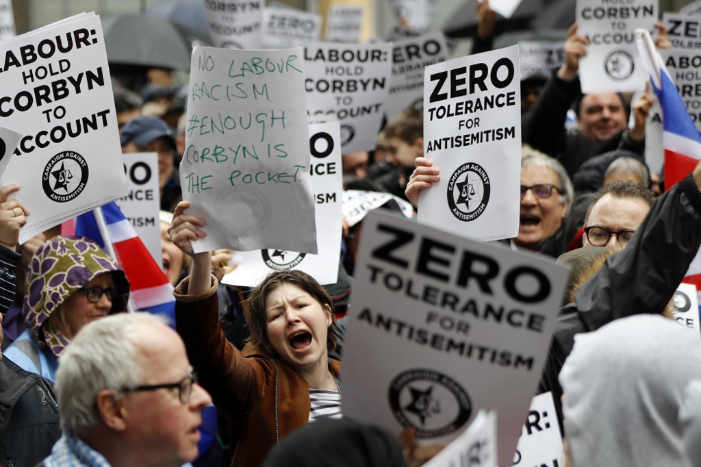 People demonstrate against alleged antisemitism in the UK Labour Party in 2018 (AFP)