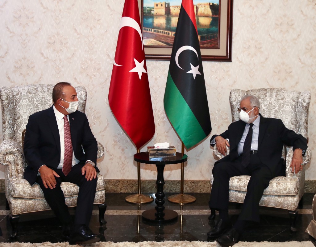 Turkish Foreign Minister Mevlut Cavusoglu meets Libyan Foreign Minister Mohamed Taha Siala in Tripoli on 17 June (Turkish Foreign Ministry/AFP)