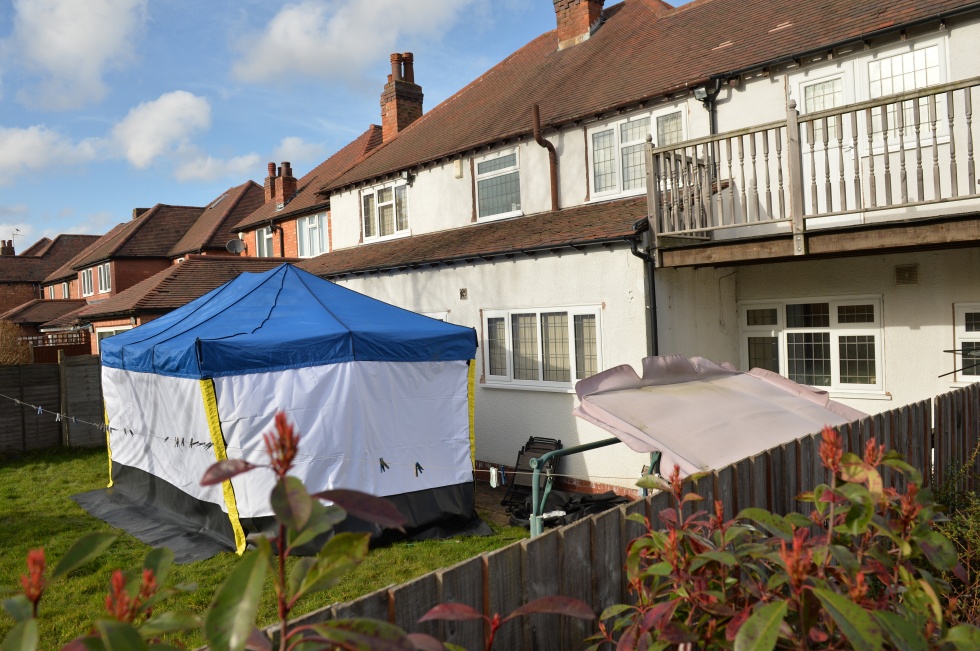 A police forensic tent is seen in the garden of a house in Birmingham, central England on 25 February, 2014 where former Guantanamo Bay detainee Moazzam Begg was arrested (AFP)