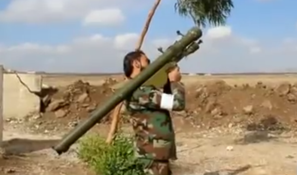 A member of Ansar al-Islam Front hold an SA-7 anti-aircraft missile (screegrab)