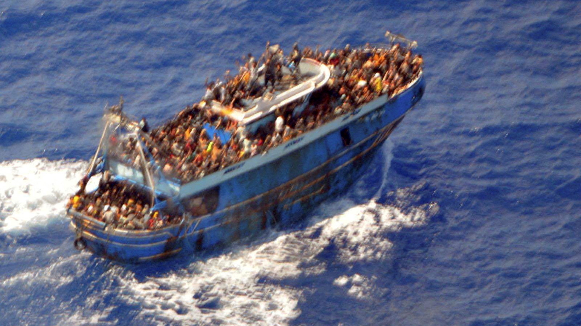 An undated handout photo provided by the Hellenic Coast Guard shows migrants onboard a boat during a rescue operation, before their boat capsized off Greece 14 June 2023 (Reuters)