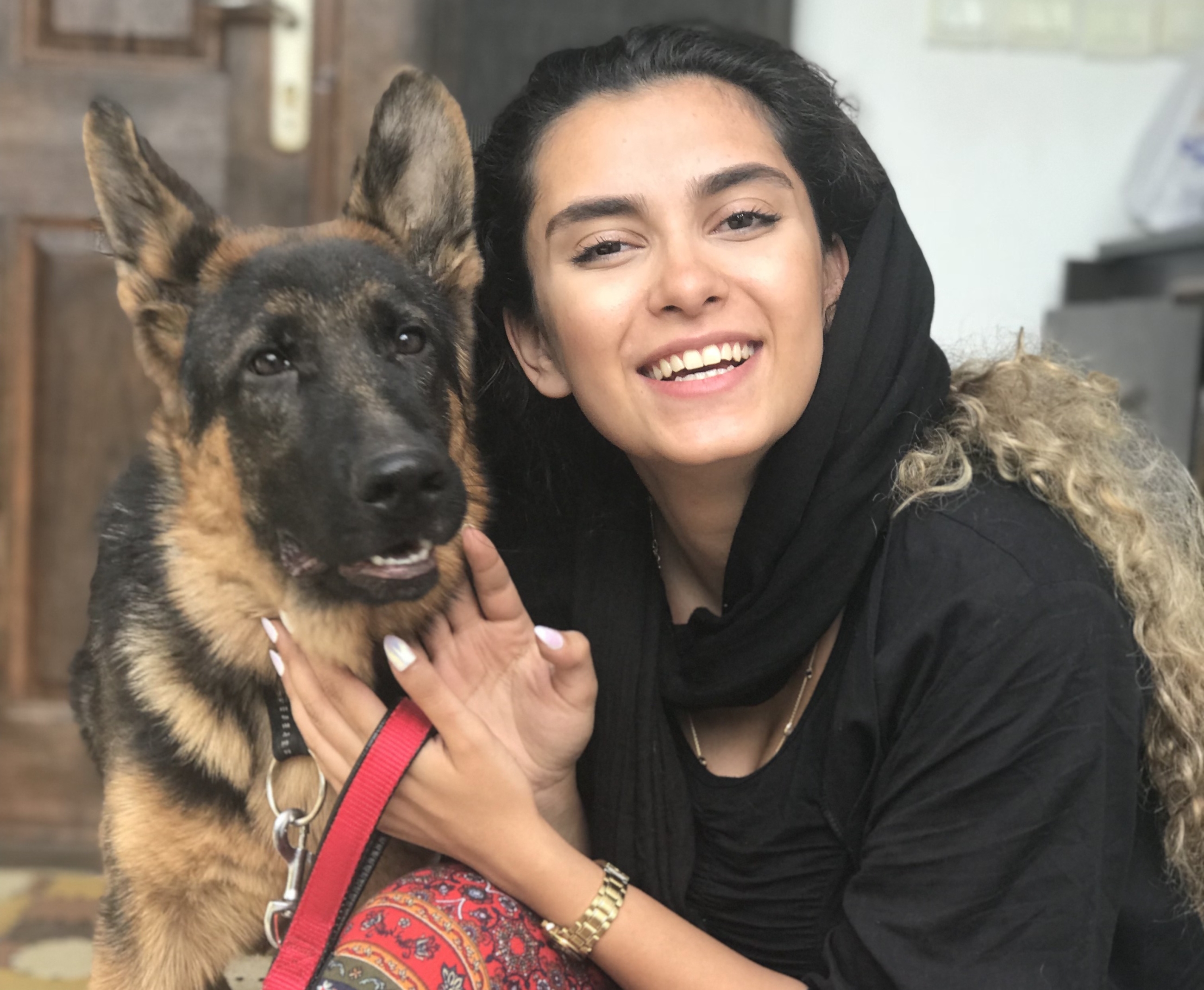 Iranian woman and her dog during pandemic MEE