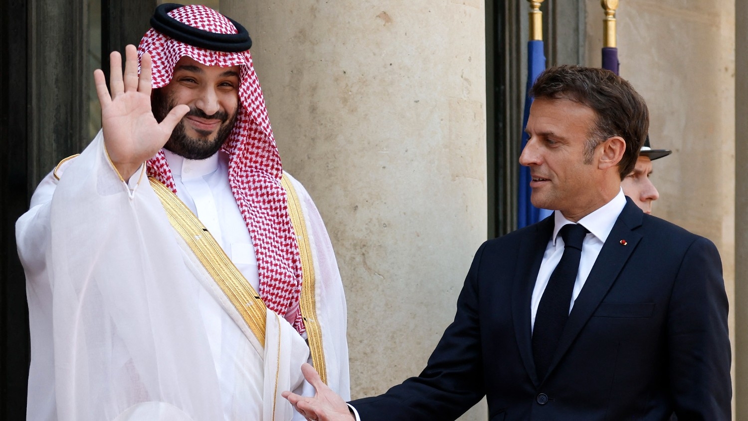 France's President Emmanuel Macron greets Saudi Crown Prince Mohammed bin Salman as he arrives at presidential Elysee Palace in Paris on 16 June 2023.