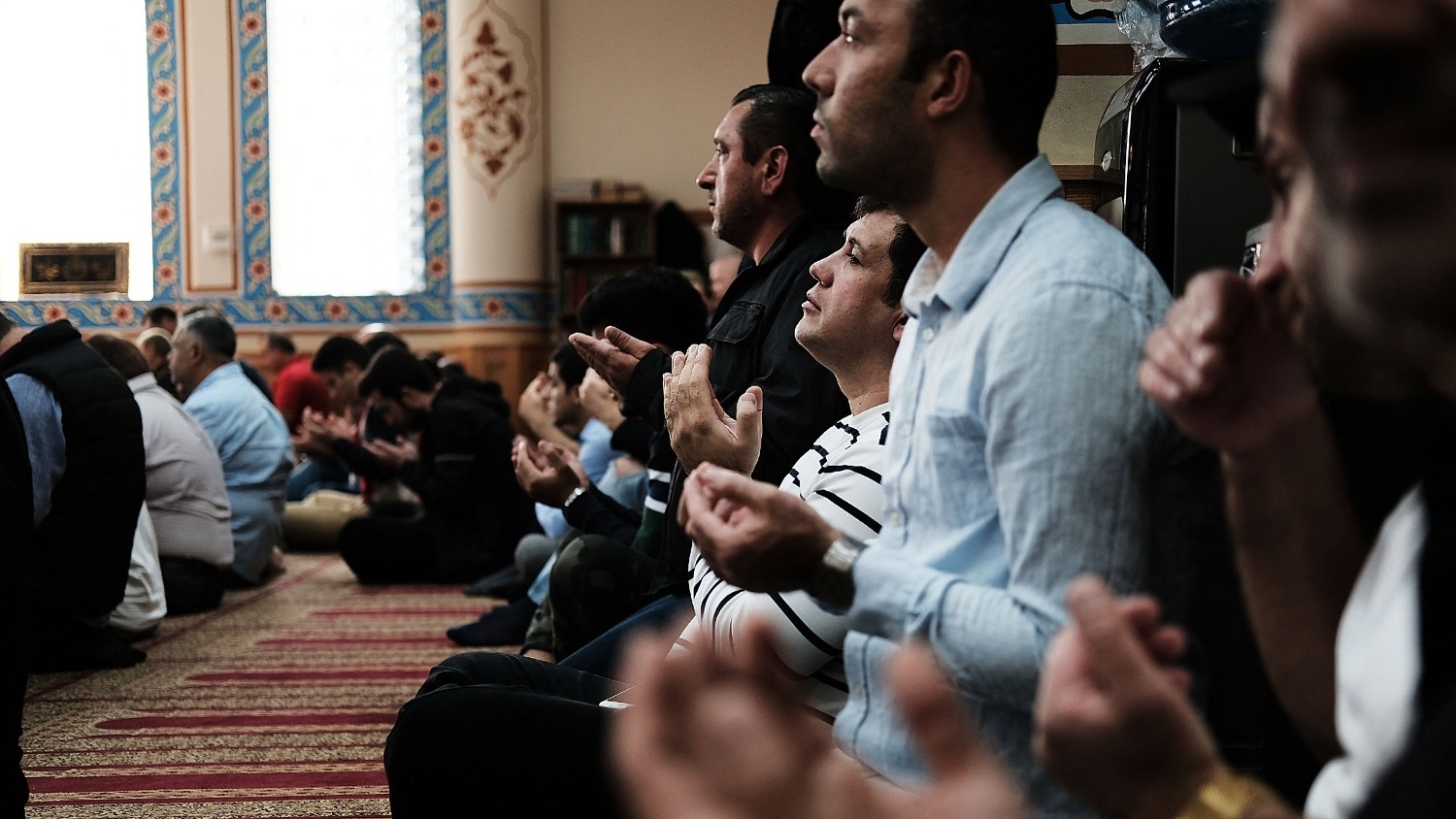 Men pray in the Eyup Cultural Center mosque on 3 November 2017 in New York City.