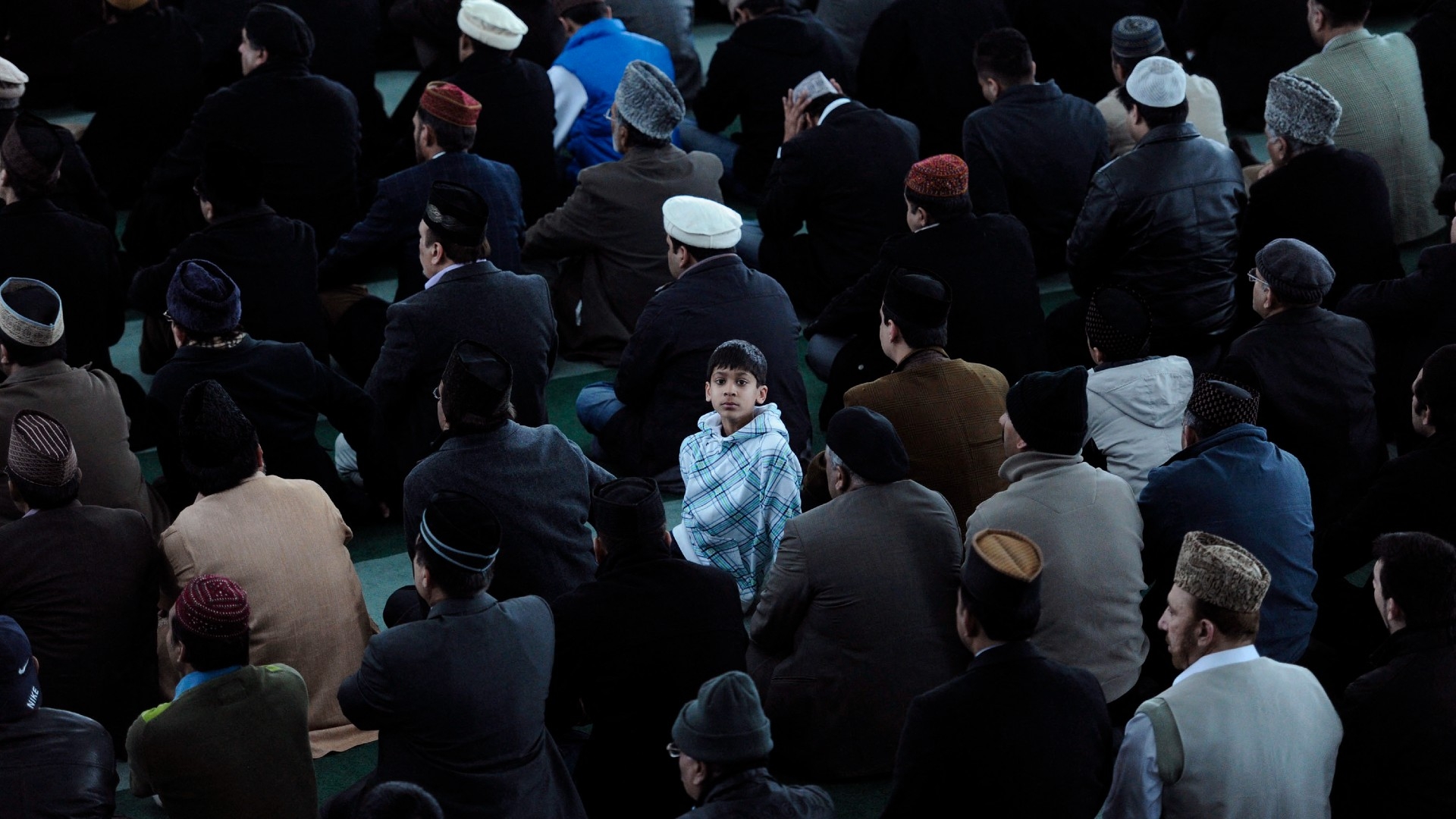 Muslims gather for Friday prayers in Baitul Futuh Mosque in south London (AFP/File photo)