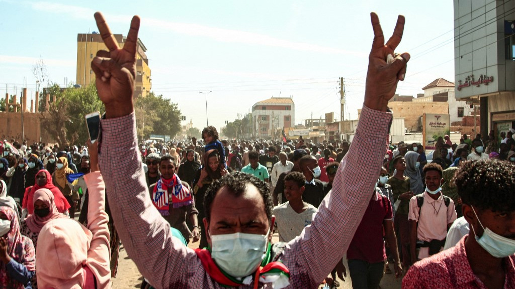 Sudanese protesters hold a demonstration against the October 2021 coup, in the capital Khartoum, on 2 January 2022 (AFP)