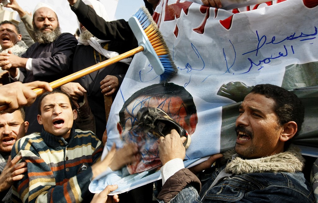 Egyptians protest in Cairo’s Tahrir Square in January 2011 (AFP)