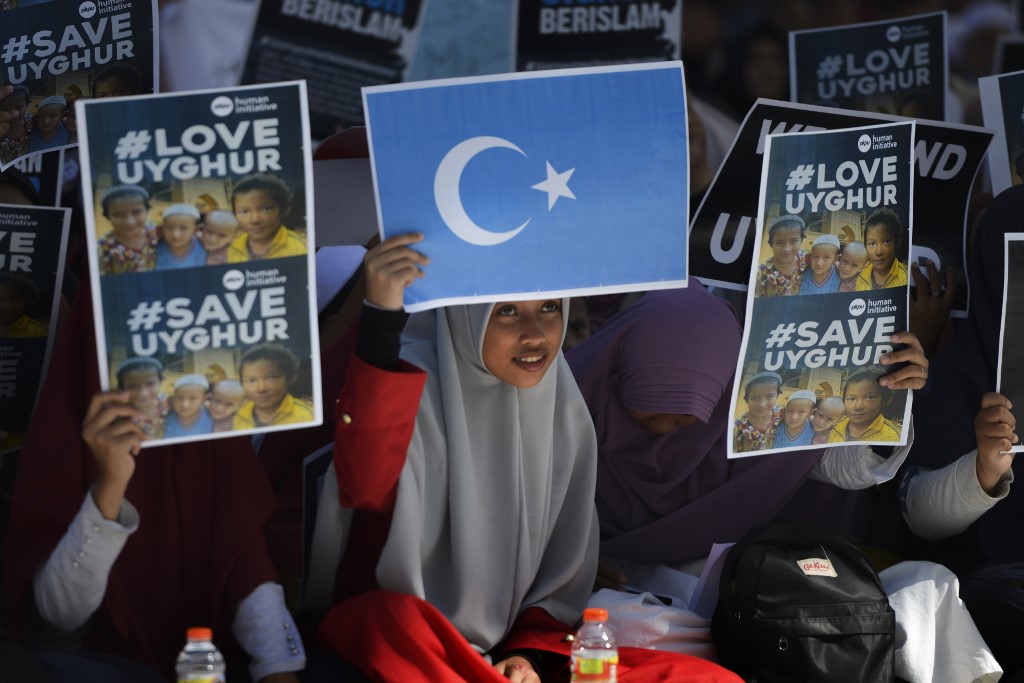 Indonesian Muslims denounce China’s policy on Uighurs on 21 December (AFP)